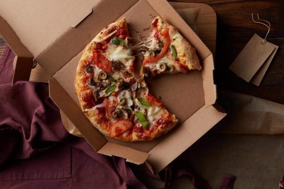 pizza on cardboard